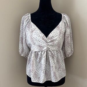 Elegant White and Black Patterned Blouse